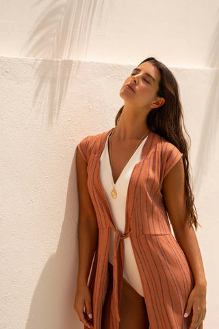 Model wearing the Layet terracotta navy striped maxi kaftan, viscose linen by Sofia Godinho
