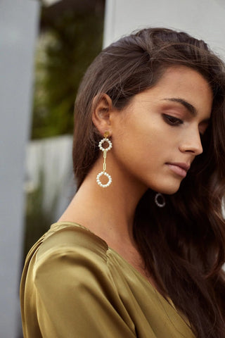 Model wearing Pearly Circle Double Earrings – modern elegance