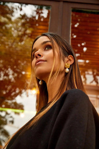 Model wearing Pearly Drop Earrings – timeless elegance