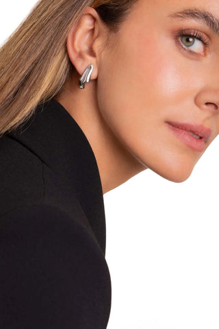 Model wearing Sculpted Earrings — modern sculptural design